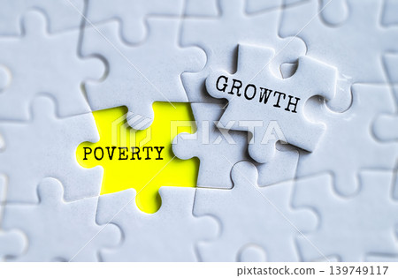 Poverty and Growth yellow puzzle pieces on gray jigsaw background, economic development and social inequality awareness concept Poverty and Growth yellow puzzle pieces on gray jigsaw background, economic development and social inequality awareness concept 139749117