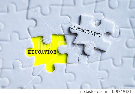 Education and Opportunity yellow puzzle pieces on gray jigsaw background, learning and career development social concept Education and Opportunity yellow puzzle pieces on gray jigsaw background, learning and career development social concept 139749121