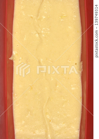 Raw Cake Batter Texture in Red Mold Raw Cake Batter Texture in Red Mold 139749314