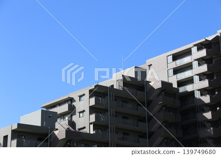 The exterior and staircase of a condominium building stand out against the blue sky (Gardenaville Ichikawa Myoden, Ichikawa City, Chiba Prefecture) 139749680