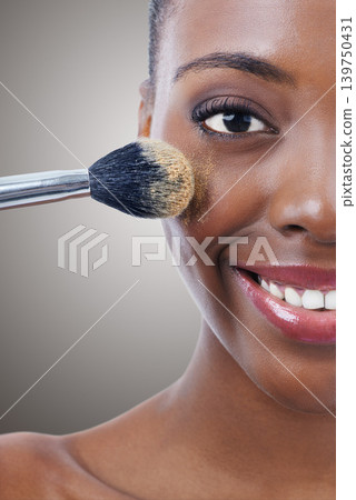 Brush, makeup and black woman, portrait and beauty with foundation for cosmetics, wellness and cropped on grey background. Shine, cosmetology and tools to apply powder, glow and shimmer in studio 139750431