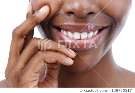 Skincare, beauty and lips of happy woman on a white background smile for wellness, cosmetics and makeup. Dermatology, salon and natural face closeup of person with gloss, lipstick and teeth in studio Skincare, beauty and lips of happy woman on a white background smile for wellness, cosmetics and makeup. Dermatology, salon and natural face closeup of person with gloss, lipstick and teeth in studio 139750517