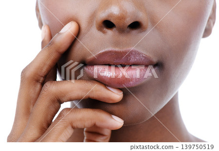Skincare, beauty and lips of black woman on a white background for wellness, cosmetics and makeup. Dermatology, salon and face closeup of person with gloss, lipstick and natural skin in studio Skincare, beauty and lips of black woman on a white background for wellness, cosmetics and makeup. Dermatology, salon and face closeup of person with gloss, lipstick and natural skin in studio 139750519