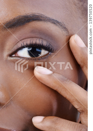 Eye, closeup and black woman with beauty, vision and skincare with dermatology. Half, portrait and African model with natural makeup and nails on face with healthy skin from cosmetics or facial 139750520