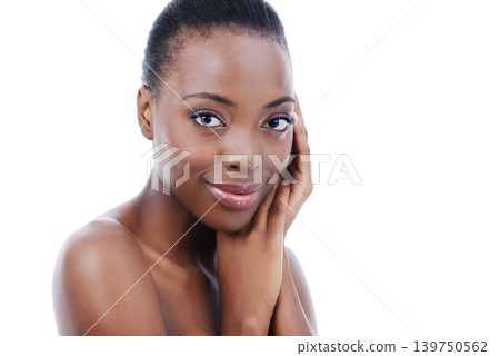 Makeup, portrait and happy black woman in studio with wellness, cosmetics or glowing skin results on white background. Beauty, smile or model with hands on face for foundation texture satisfaction Makeup, portrait and happy black woman in studio with wellness, cosmetics or glowing skin results on white background. Beauty, smile or model with hands on face for foundation texture satisfaction 139750562