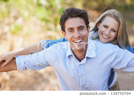 Couple, portrait and smile in nature with love in relationship for holiday, vacation or travel. Romance, man and woman with happy outdoor in forest with embrace for bonding, care or relax in woods Couple, portrait and smile in nature with love in relationship for holiday, vacation or travel. Romance, man and woman with happy outdoor in forest with embrace for bonding, care or relax in woods 139750704
