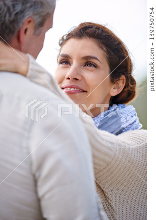 Couple, outdoor and smile with love at beach with kindness, support and care in marriage. Happy, woman and gratitude for partner on holiday, date or relax on vacation together in calm morning Couple, outdoor and smile with love at beach with kindness, support and care in marriage. Happy, woman and gratitude for partner on holiday, date or relax on vacation together in calm morning 139750754
