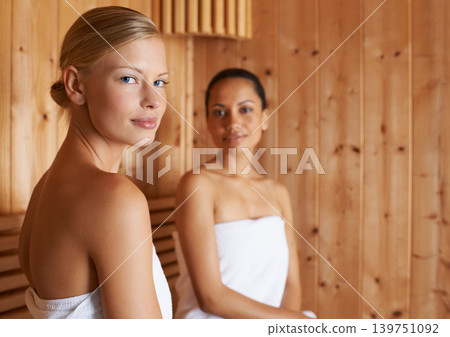 Sauna, portrait and women relax in spa for beauty, healthy detox of sweat for skincare wellness. Luxury, treatment and friends sitting together in steam room for facial, anti aging or benefits Sauna, portrait and women relax in spa for beauty, healthy detox of sweat for skincare wellness. Luxury, treatment and friends sitting together in steam room for facial, anti aging or benefits 139751092