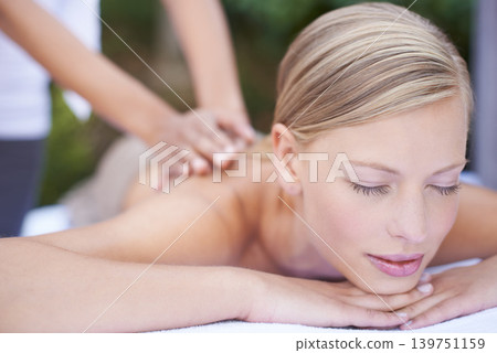 Woman, massage and therapist for wellness, back and spa for treatment and stress relief therapy. Sleeping, masseuse and resting in resort, peaceful and hands for luxury body care and relaxation Woman, massage and therapist for wellness, back and spa for treatment and stress relief therapy. Sleeping, masseuse and resting in resort, peaceful and hands for luxury body care and relaxation 139751159