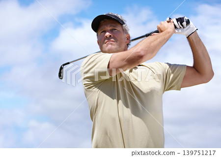 Sport, man and golf outdoor with swing for playing, performance or game with fitness and wellness. Athlete, mature person and golfer with club, blue sky and exercise for recreation, workout and hobby Sport, man and golf outdoor with swing for playing, performance or game with fitness and wellness. Athlete, mature person and golfer with club, blue sky and exercise for recreation, workout and hobby 139751217