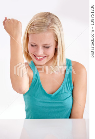 Happy, celebrate and woman punching air for achievement, success and bonus announcement in studio. Winning dance energy, deal and excited girl with fist up in celebration isolated on white background Happy, celebrate and woman punching air for achievement, success and bonus announcement in studio. Winning dance energy, deal and excited girl with fist up in celebration isolated on white background 139751236