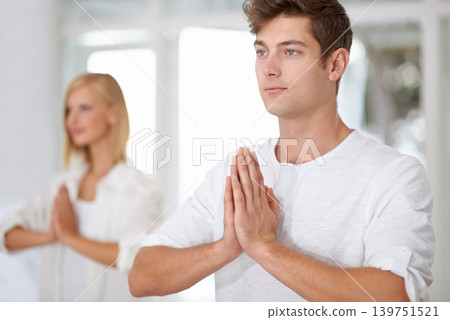 Prayer hands, meditation and people in a studio with peace, zen and mental health, wellness or balance. Mindfulness, relax and team with holistic, breathing or energy exercise for spiritual awareness Prayer hands, meditation and people in a studio with peace, zen and mental health, wellness or balance. Mindfulness, relax and team with holistic, breathing or energy exercise for spiritual awareness 139751521