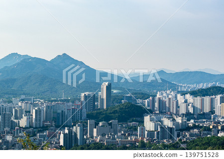 Seoul, South Korea - May. 17, 2026 : Panoramic high-angle view of Seoul cityscape and residential area from Yongmasan Mountain skywalk, South Korea 139751528