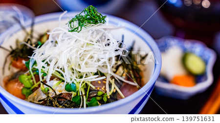 A seafood rice bowl featuring fatty sardines caught during the rainy season. [Seasonal Seafood] 139751631