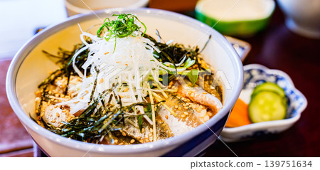 A seafood rice bowl featuring fatty sardines caught during the rainy season. [Seasonal Seafood] 139751634