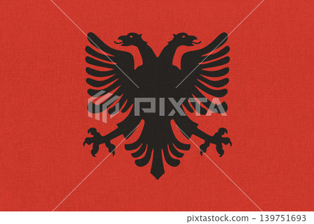 Historical flag of Democratic Government of Albania 1944 1946 on fabric texture Historical flag of Democratic Government of Albania 1944 1946 on fabric texture 139751693
