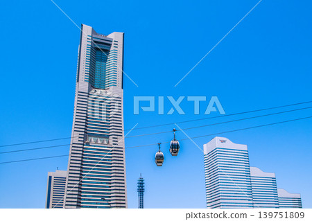 A new era for Yokohama's urban landscape. Yokohama Landmark Tower and Yokohama Air Cabin stand out against the blue sky = May 18 139751809