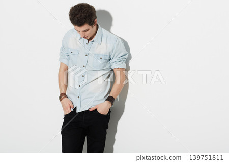 Fashion, confidence and man in studio on mockup space isolated on a white background. Cool, style and model with hands in pocket, casual clothes and serious young person in trendy apparel on backdrop Fashion, confidence and man in studio on mockup space isolated on a white background. Cool, style and model with hands in pocket, casual clothes and serious young person in trendy apparel on backdrop 139751811