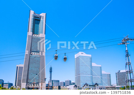 A new era for Yokohama's urban landscape. Yokohama Landmark Tower and Yokohama Air Cabin stand out against the blue sky = May 18 A new era for Yokohama's urban landscape. Yokohama Landmark Tower and Yokohama Air Cabin stand out against the blue sky = May 18 139751836