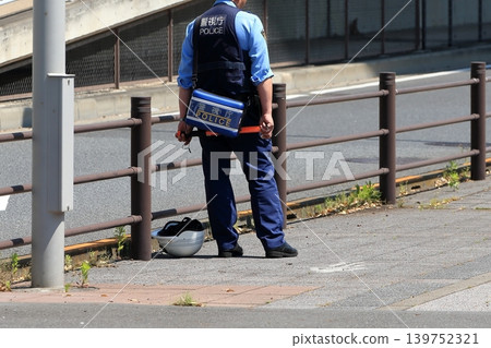 Police officers cracking down on traffic violations 139752321