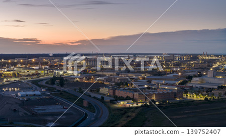 Drone view showcasing its chemical, petrochemical, and port industries at evening Drone view showcasing its chemical, petrochemical, and port industries at evening 139752407