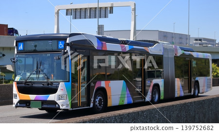 Articulated bus in motion Articulated bus in motion 139752682
