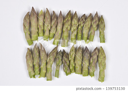 Two Rows of Fresh Green Asparagus Tips 139753130