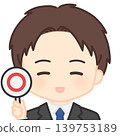Male employee holding the correct answer card 139753189