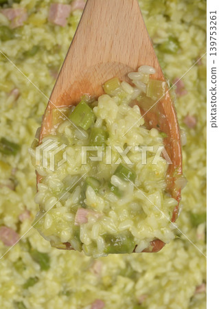 Wooden Spoon with Asparagus and Ham Risotto Wooden Spoon with Asparagus and Ham Risotto 139753261