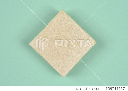 Handmade olive oil soap bar on green background Handmade olive oil soap bar on green background 139753317