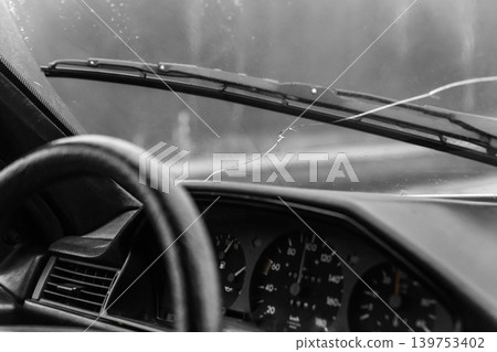 Crack on windshield broken car window glass damage vehicle Crack on windshield broken car window glass damage vehicle 139753402