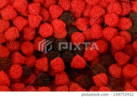 Red black color sweet sugar chewing raspberries blackberries gummy candy background food Red black color sweet sugar chewing raspberries blackberries gummy candy background food 139753412