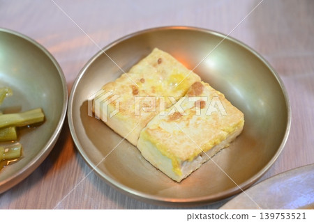 Pan fried Tofu Side Dish Served in Traditional Korean food Pan fried Tofu Side Dish Served in Traditional Korean food 139753521