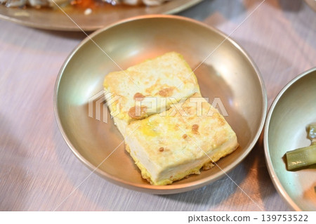 Pan fried Tofu Side Dish Served in Traditional Korean food Pan fried Tofu Side Dish Served in Traditional Korean food 139753522