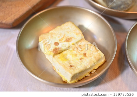 Pan fried Tofu Side Dish Served in Traditional Korean food Pan fried Tofu Side Dish Served in Traditional Korean food 139753526