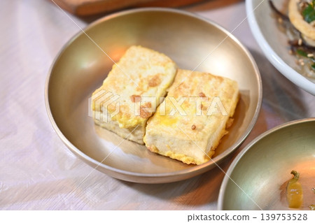 Pan fried Tofu Side Dish Served in Traditional Korean food Pan fried Tofu Side Dish Served in Traditional Korean food 139753528