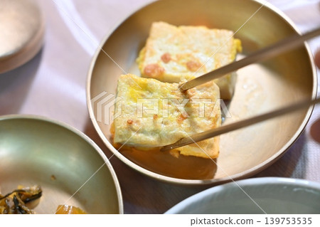 Pan fried Tofu Side Dish Served in Traditional Korean food Pan fried Tofu Side Dish Served in Traditional Korean food 139753535