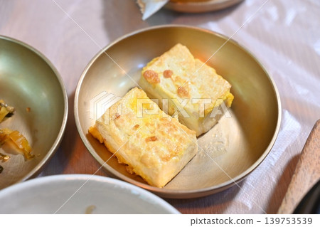 Pan fried Tofu Side Dish Served in Traditional Korean food 139753539