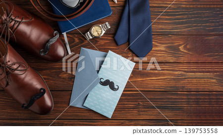 Father's Day concept flat lay with greeting card and accessories Father's Day concept flat lay with greeting card and accessories 139753558