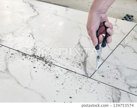 Grout line cleaning 139753574
