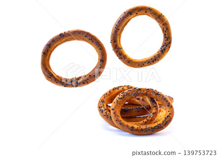 Golden bakery bagels isolated on clean white backdrop Golden bakery bagels isolated on clean white backdrop 139753723