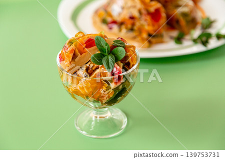 gourmet coffee fruit jelly with mint garnish on soft green background gourmet coffee fruit jelly with mint garnish on soft green background 139753731