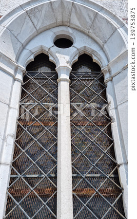 Neo Gothic window of Capuchin Church of Our Lady of Lourdes in Rijeka Neo Gothic window of Capuchin Church of Our Lady of Lourdes in Rijeka 139753875