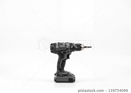 A modern cordless screwdriver with a bat installed, isolated on a white background with plenty of space for text. The concept of repair, construction, installation and home tools. A modern cordless screwdriver with a bat installed, isolated on a white background with plenty of space for text. The concept of repair, construction, installation and home tools. 139754099