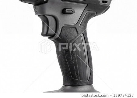 Cordless drill handle close up isolated on white background Cordless drill handle close up isolated on white background 139754123