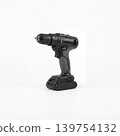 Modern cordless drill isolated on white background, shown in clean studio lighting. Portable power tool for repair, construction, installation, furniture assembly, workshop, and DIY use. 139754132