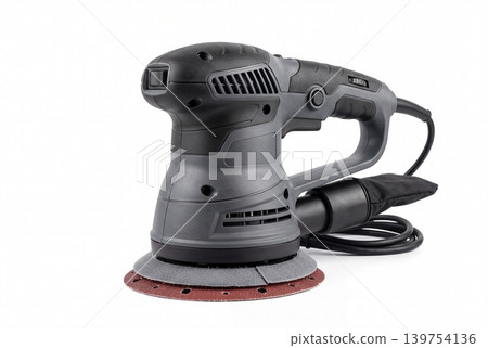 Modern random orbital sander with sanding disc and dust bag isolated on white background. Electric power tool for woodworking, polishing, finishing, renovation, repair and workshop use. Modern random orbital sander with sanding disc and dust bag isolated on white background. Electric power tool for woodworking, polishing, finishing, renovation, repair and workshop use. 139754136