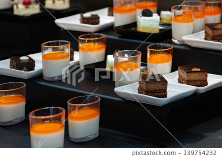 The kitchen aboard the abstract luxury cruise ship. Cakes with blackberry for Dining Room Buffet The kitchen aboard the abstract luxury cruise ship. Cakes with blackberry for Dining Room Buffet 139754232