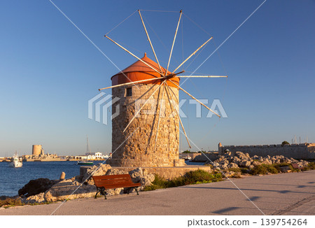 Historic Windmill at Mandraki Harbor in Rhodes Greece Historic Windmill at Mandraki Harbor in Rhodes Greece 139754264