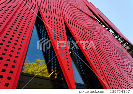 Exterior view of Horacka multifunctional arena in Jihlava, Vysocina region, Czechia, on a sunny day, showing modern architecture from open public surroundings Exterior view of Horacka multifunctional arena in Jihlava, Vysocina region, Czechia, on a sunny day, showing modern architecture from open public surroundings 139754597